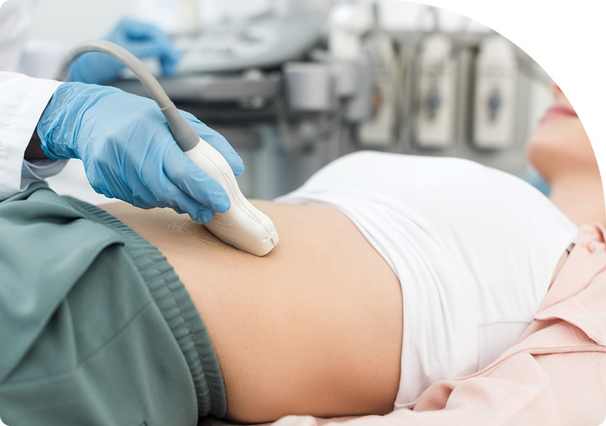 Sonographer performing an abdominal ultrasound scan