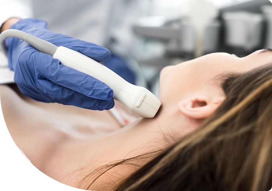 Sonographer performing a neck ultrasound scan